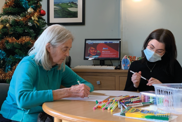 Older adult in care home enjoys activity